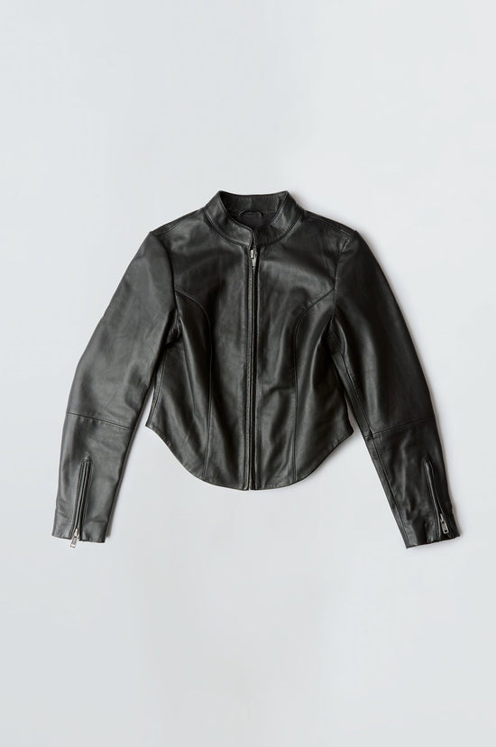 Women’s Gazelle black leather jacket by Deadwood, slim-fit racer-inspired design with center-front zipper, Mandarin collar, and zippered cuffs, made from upcycled leather.
