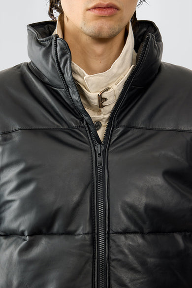 Model wearing Denver jacket in black  featuring upcycled leather, reflecting the brand’s commitment to sustainable fashion