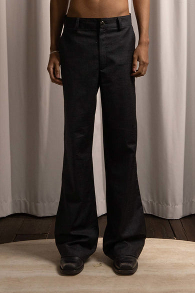 Flint straight-fit slack pants by Deadwood, front view featuring classic silhouette and slanting side pockets, crafted from deadstock fabrics.
