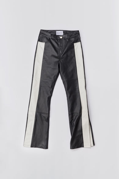 prance Black and White Leather Pants by Deadwood, featuring white stripes, bootcut fit, and slits at the leg opening, made from soft upcycled lambskin.